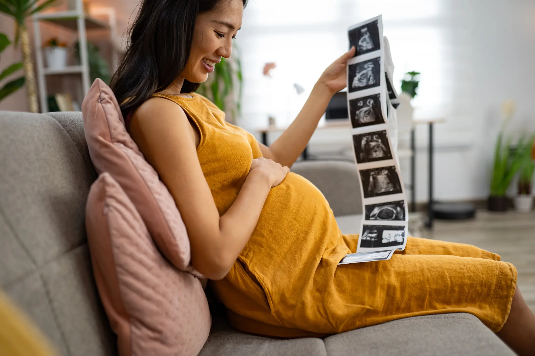 Expectant mother viewing baby scans